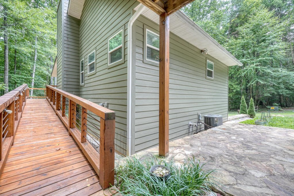 550 Watson Road Epworth, GA 30541 - Photo 12 of 63 a view of a house with backyard and trees