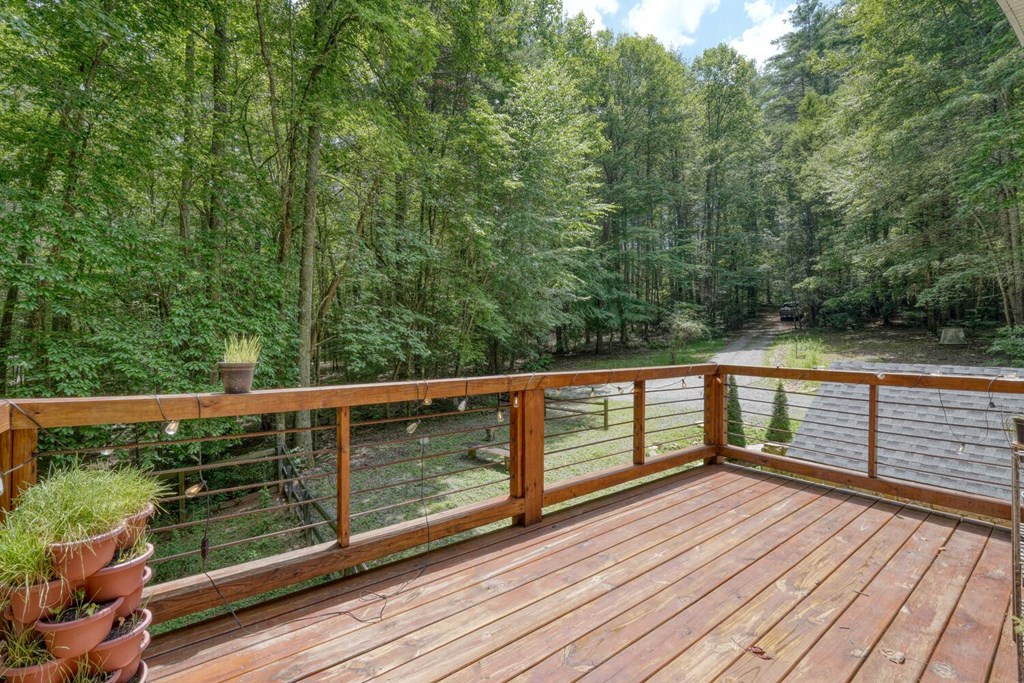 550 Watson Road Epworth, GA 30541 - Photo 51 of 63 a view of balcony with wooden floor