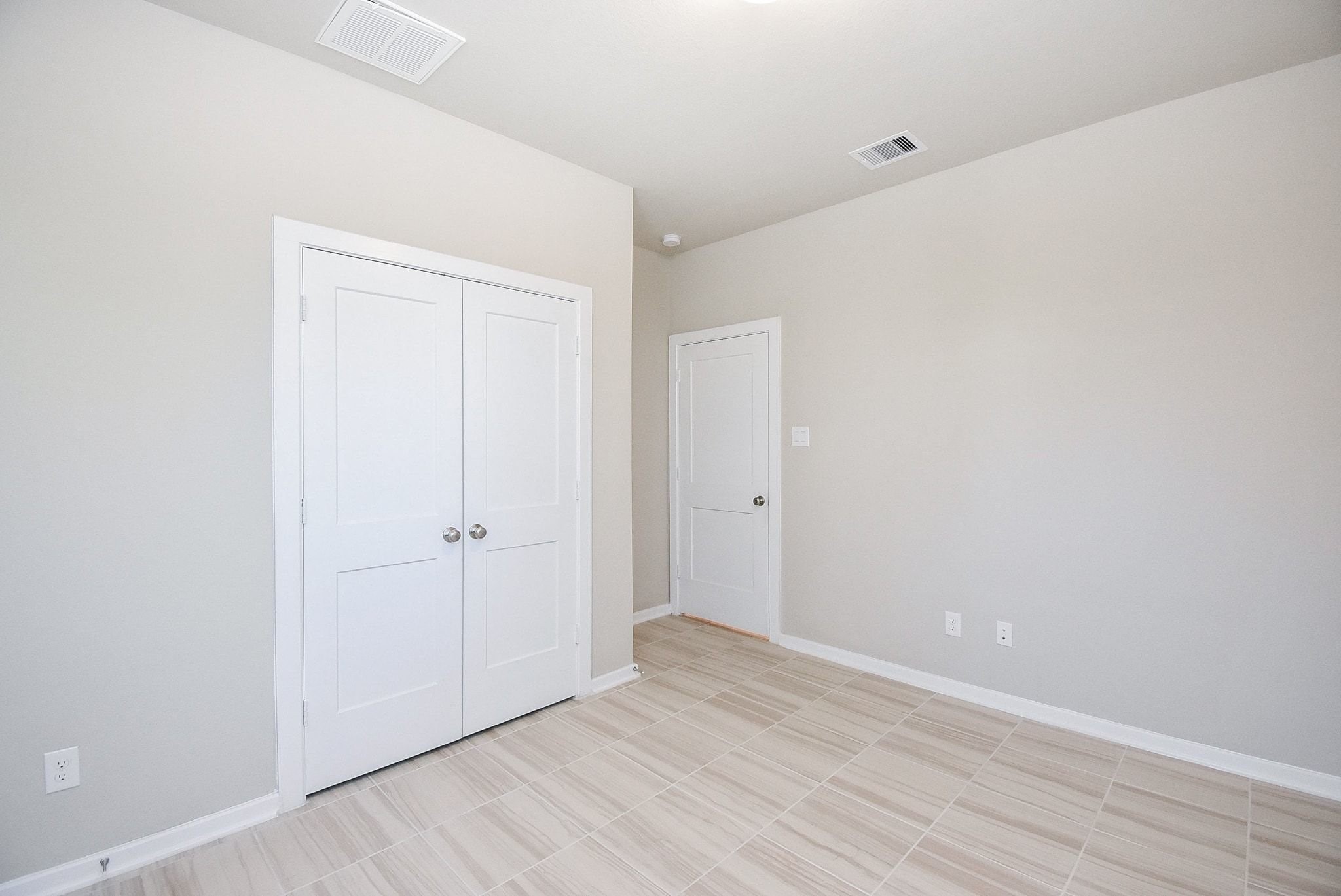 7643 Green Bulrush Way Katy, TX 77493 - Photo 19 of 20 a view of an empty room with wooden floor