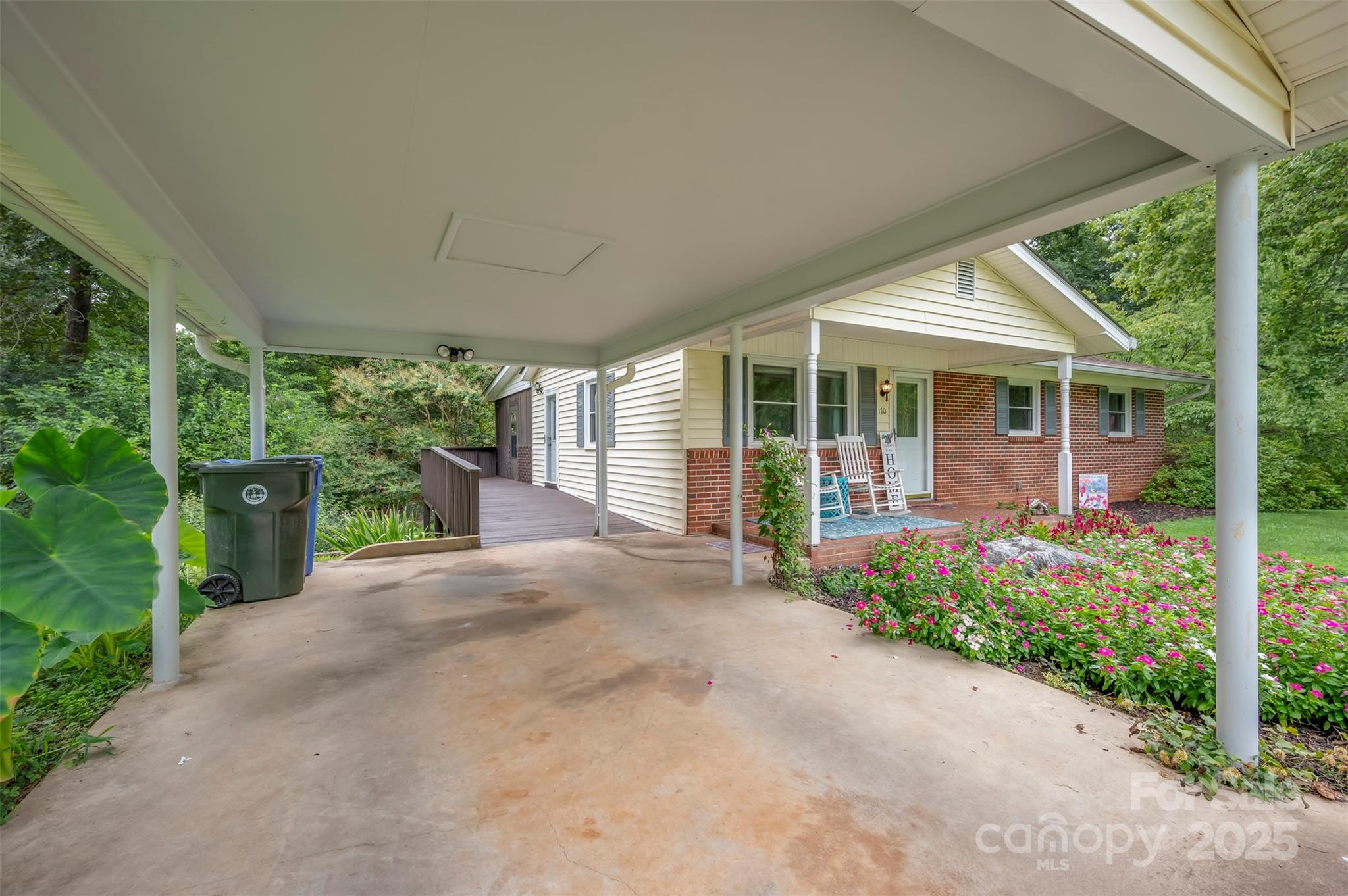 170 Hodge Street Rutherfordton, NC 28139 - Photo 11 of 48 a view of a house with porch and garden