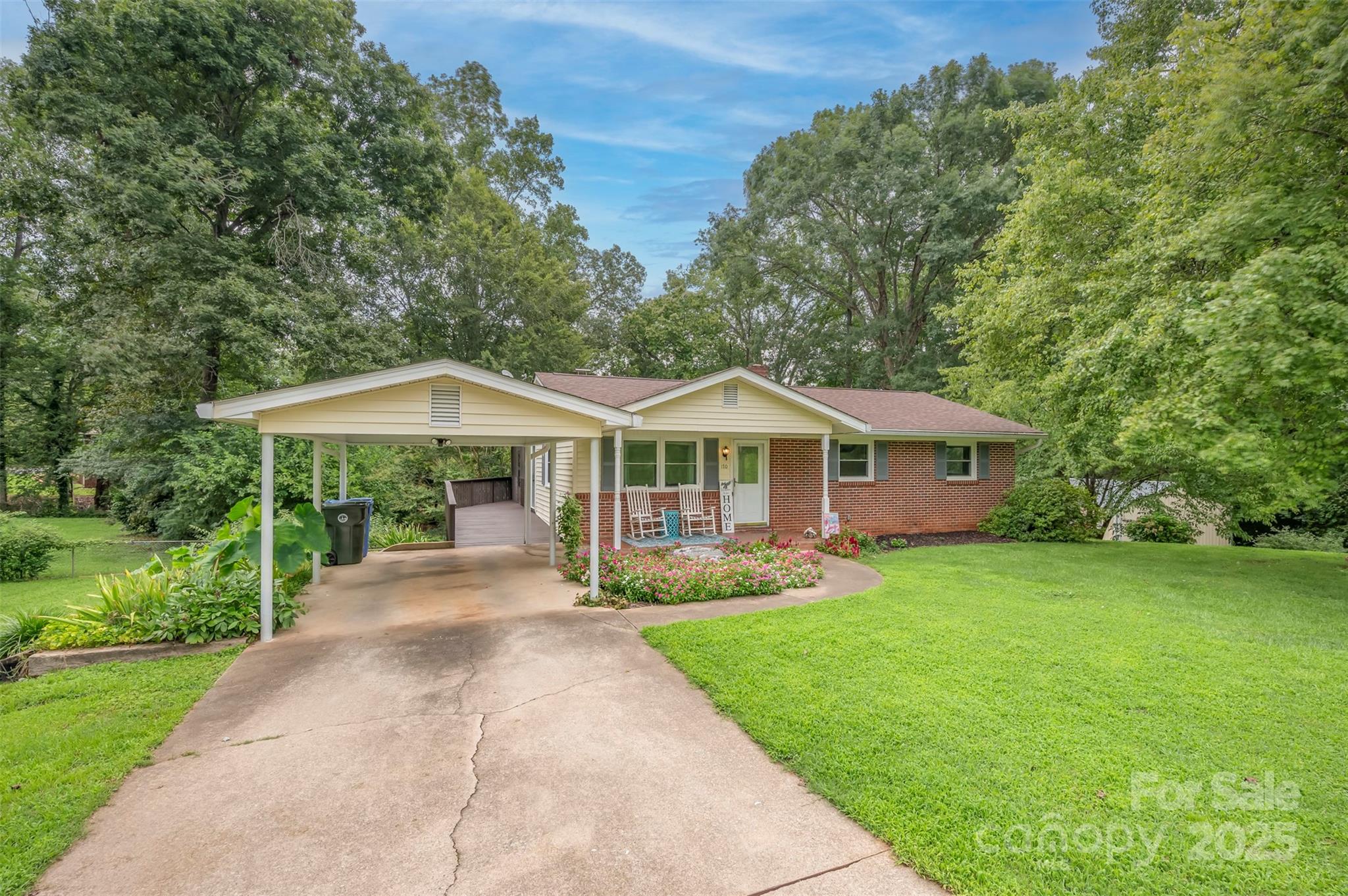 170 Hodge Street Rutherfordton, NC 28139 - Photo 12 of 48 a front view of a house with yard patio and green space