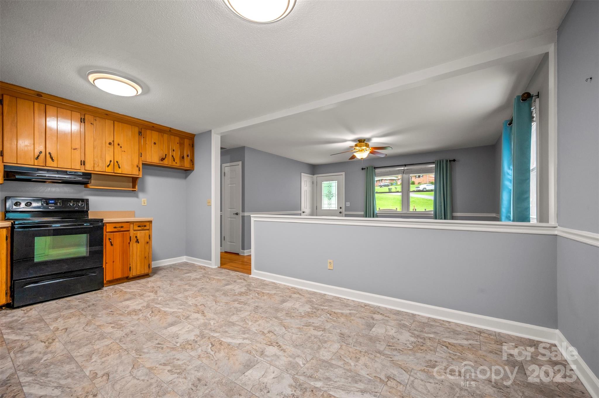 170 Hodge Street Rutherfordton, NC 28139 - Photo 17 of 48 a view of a kitchen with a stove top oven