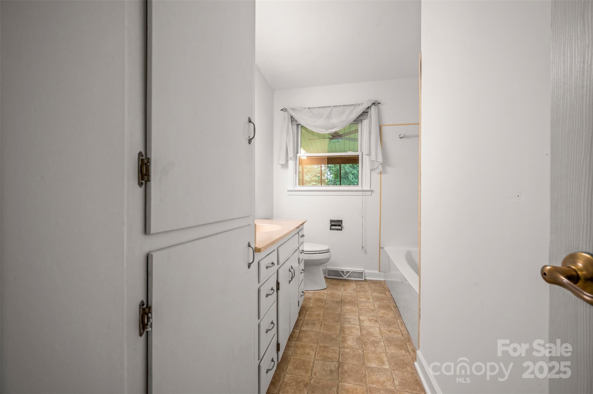 170 Hodge Street Rutherfordton, NC 28139 - Photo 21 of 48 a view of a hallway with wooden floor and a window