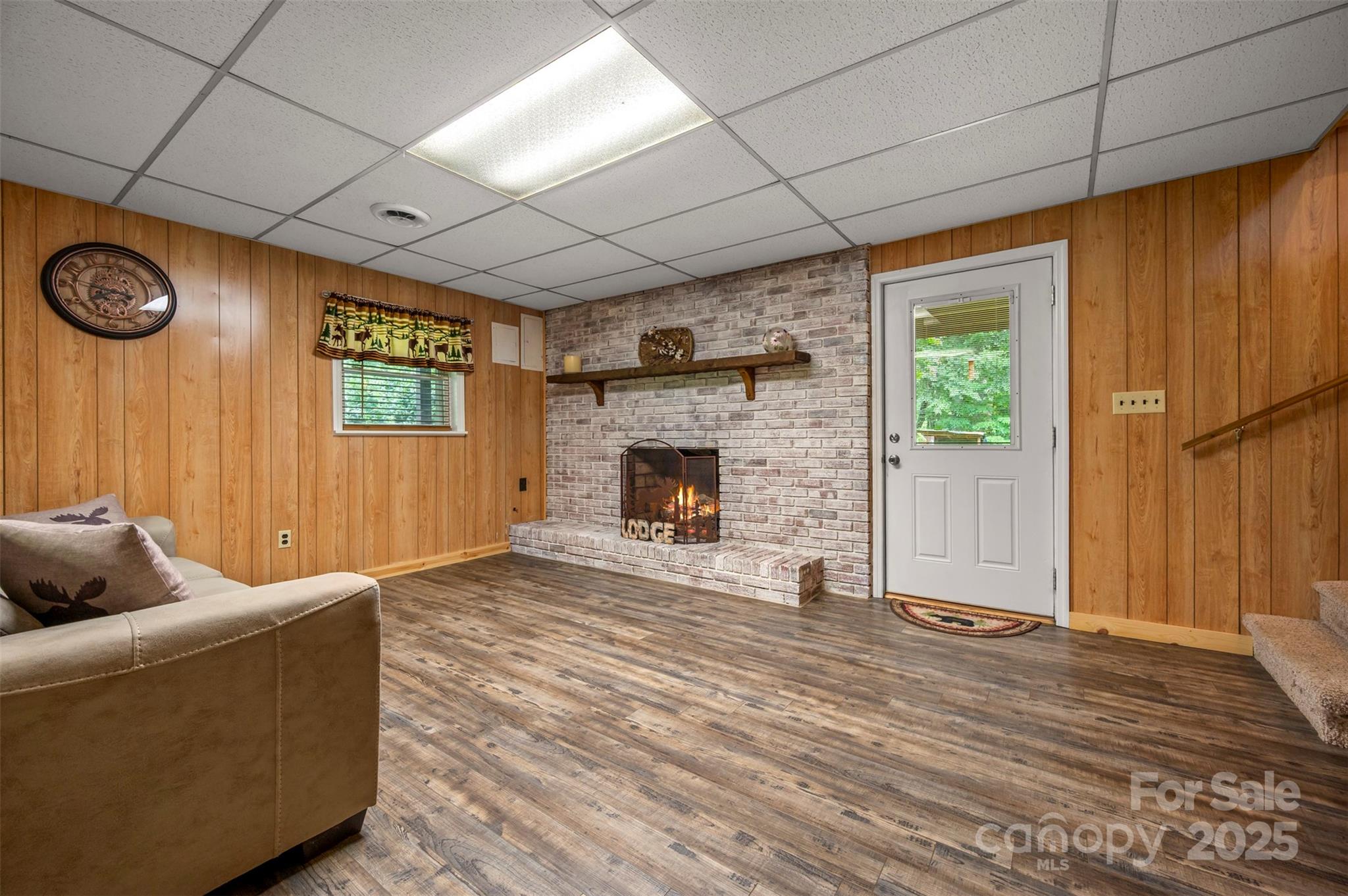170 Hodge Street Rutherfordton, NC 28139 - Photo 28 of 48 a living room with furniture and a fireplace