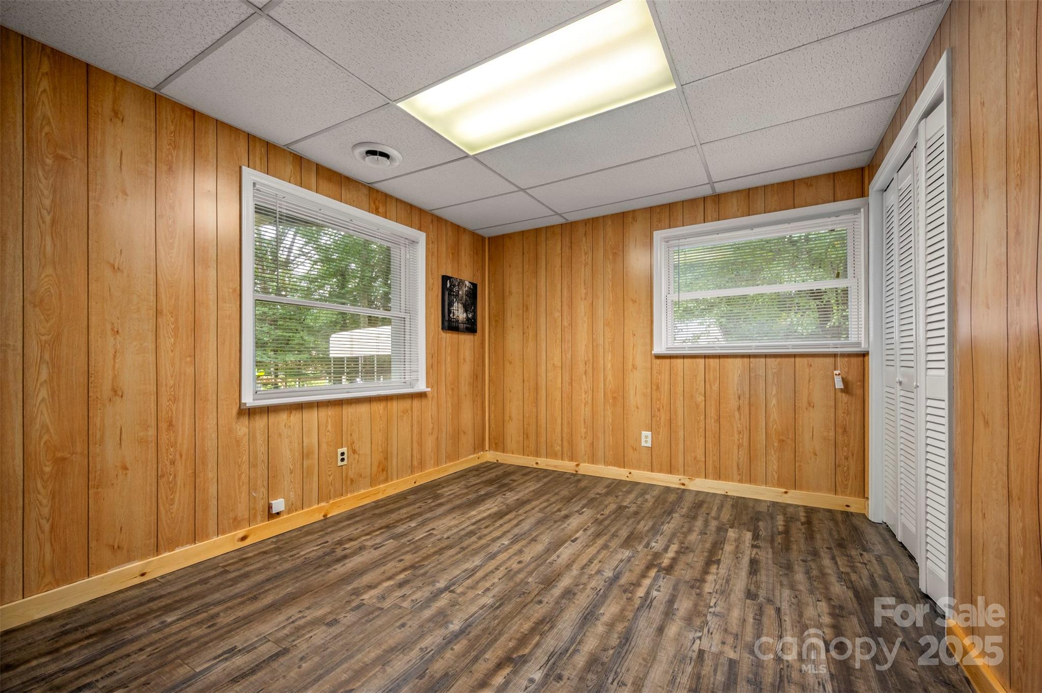 170 Hodge Street Rutherfordton, NC 28139 - Photo 34 of 48 a view of an empty room with wooden floor and a window