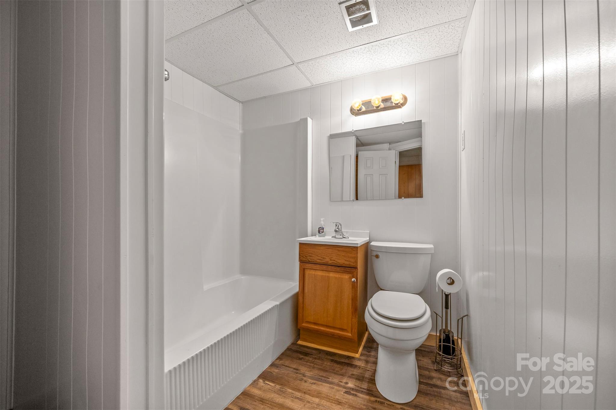 170 Hodge Street Rutherfordton, NC 28139 - Photo 36 of 48 a bathroom with a toilet a sink and bathtub