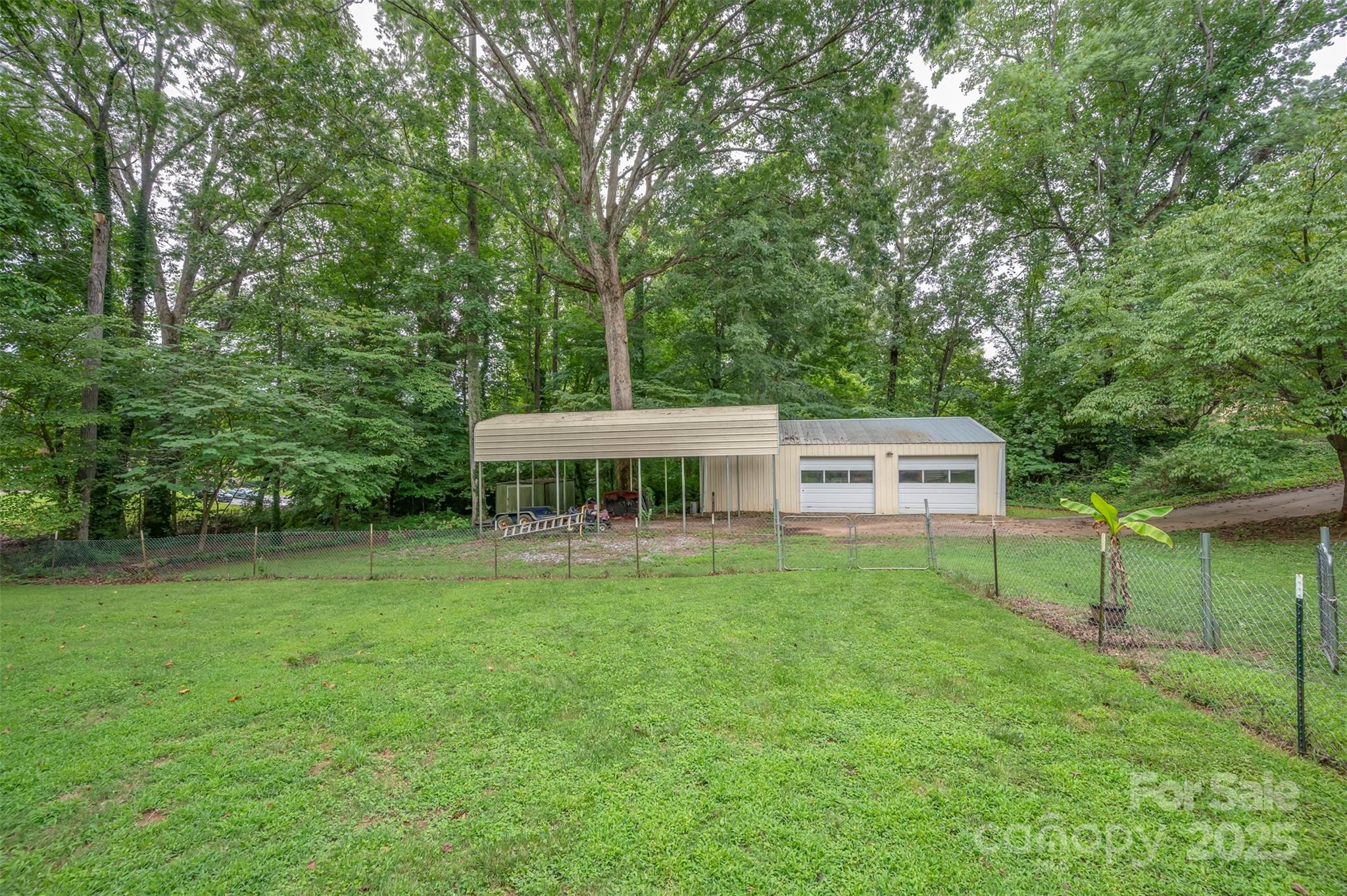 170 Hodge Street Rutherfordton, NC 28139 - Photo 45 of 48 a view of a house with a backyard