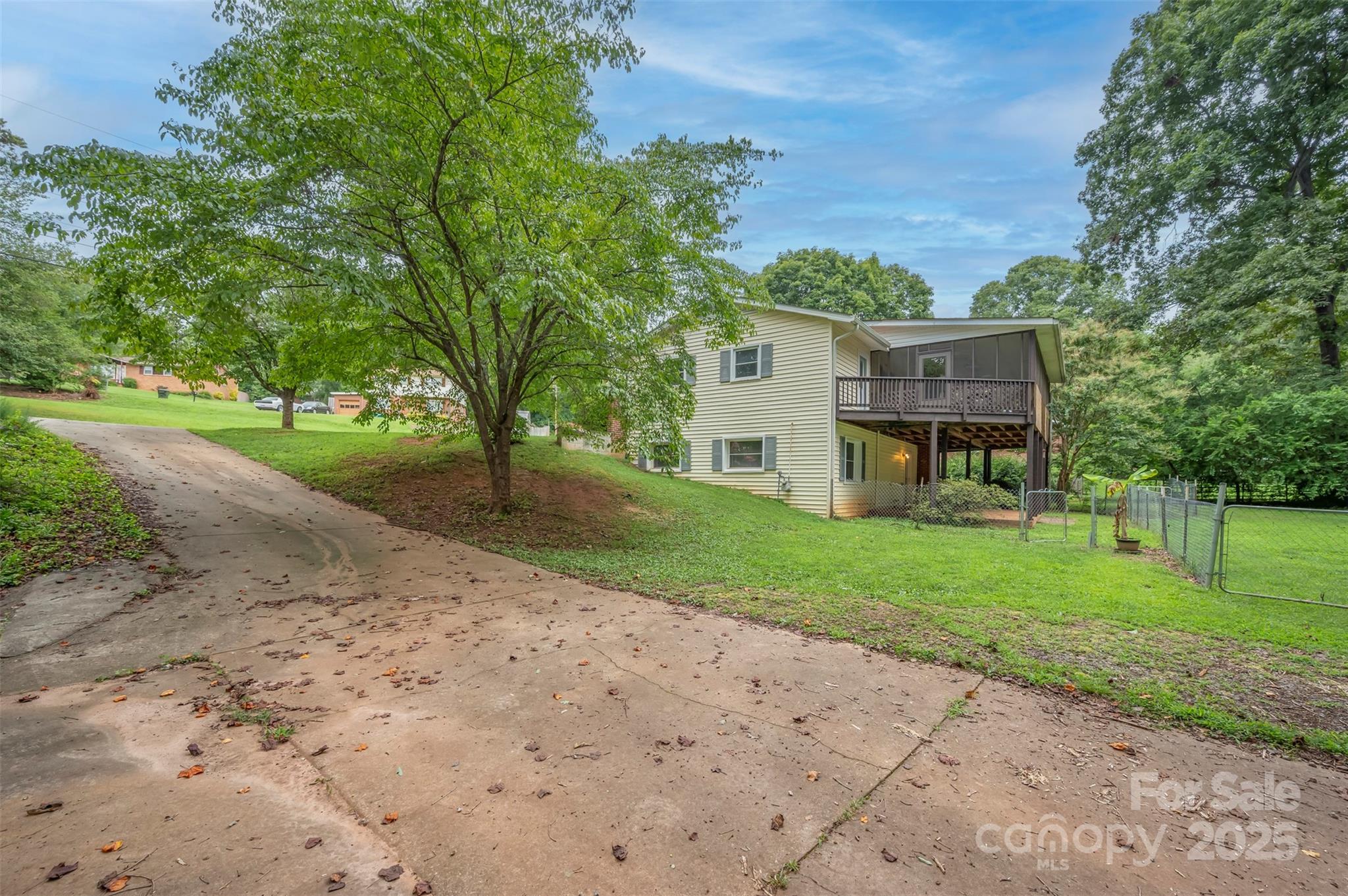 170 Hodge Street Rutherfordton, NC 28139 - Photo 47 of 48 a view of a house with a yard and large tree