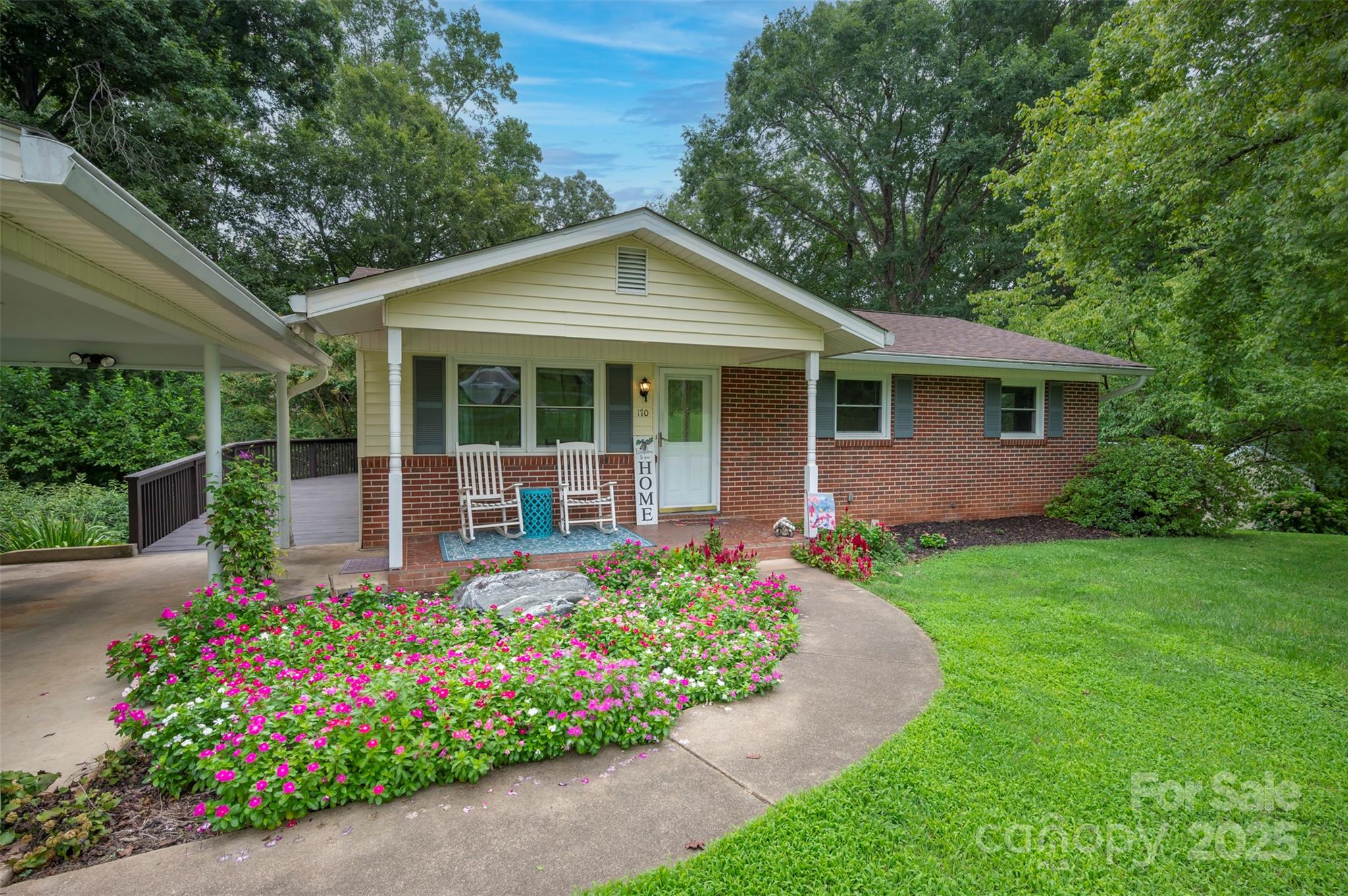 170 Hodge Street Rutherfordton, NC 28139 - Photo 6 of 48 a front view of a house with garden