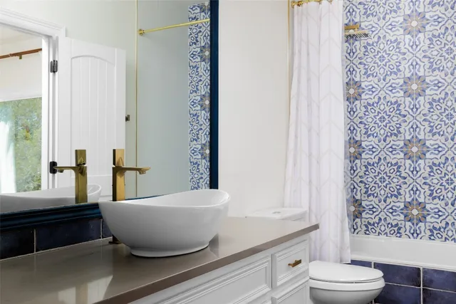 a view of balcony with wooden floor and outdoor seating