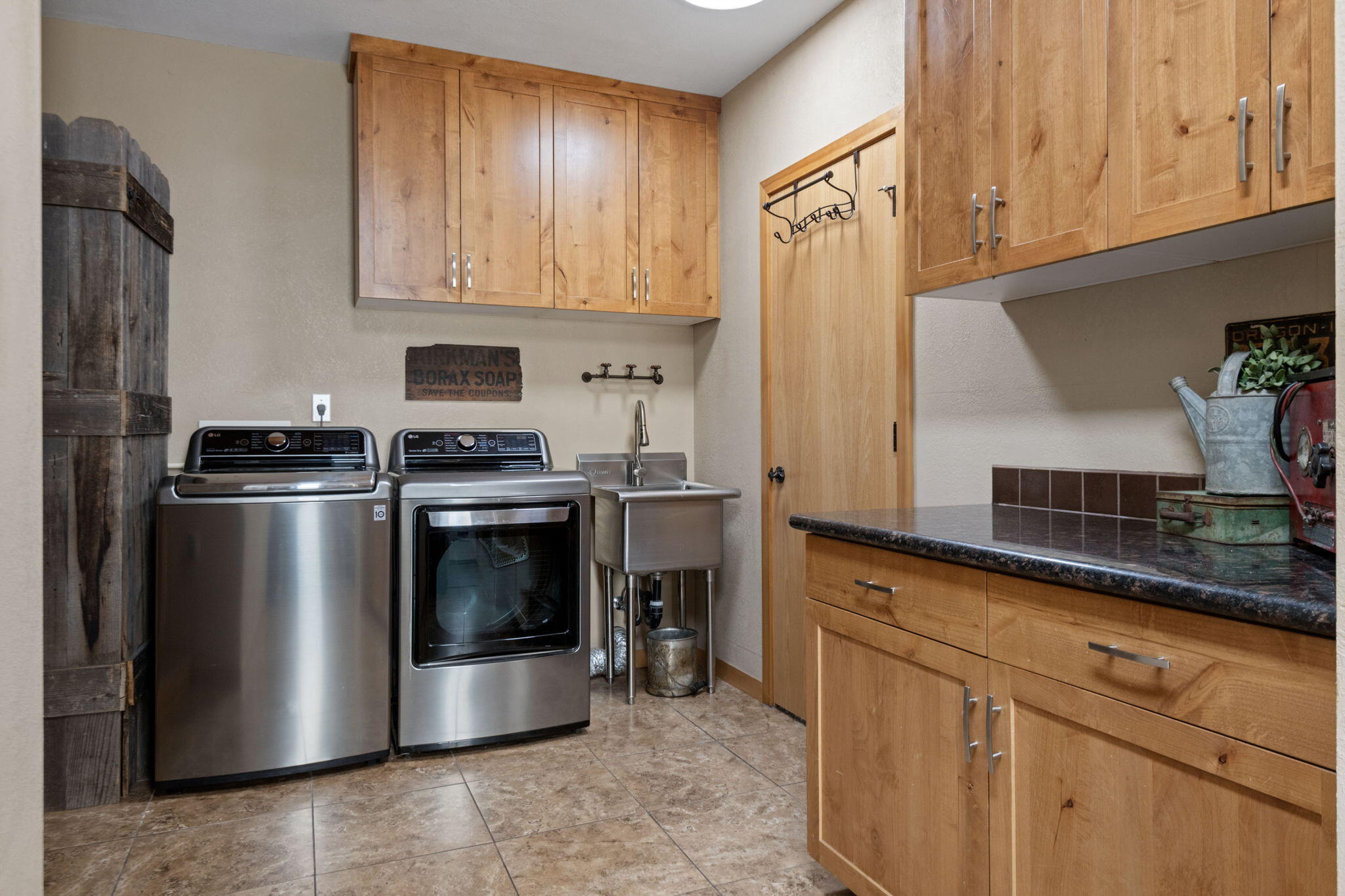 22539 Martee Lane Bend, OR 97701 - Photo 15 of 54 a kitchen with granite countertop a stove and a refrigerator