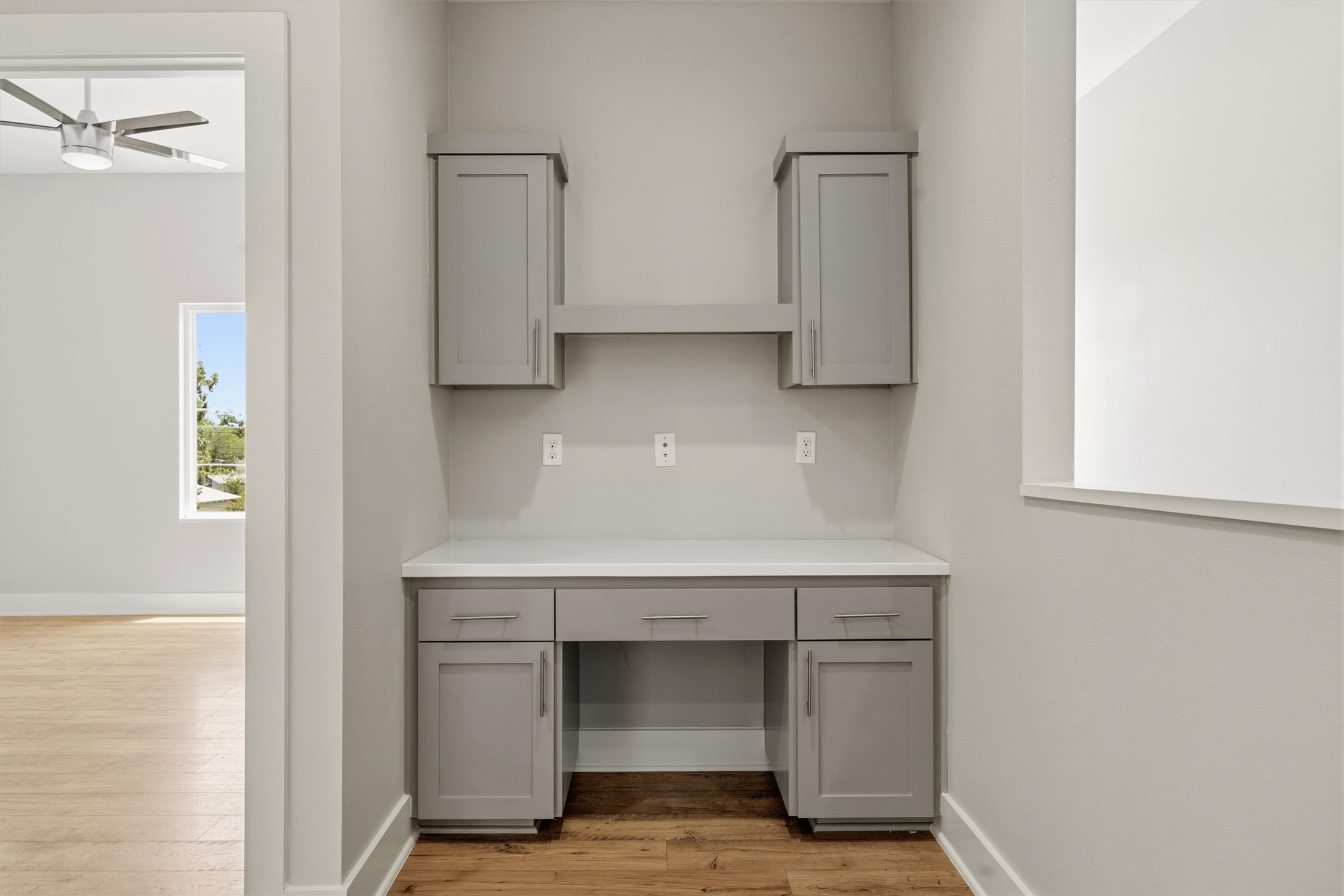 1210 Stobaugh Street, Unit B Austin, TX 78757 - Photo 16 of 40 Functional built-in desk with ample storage provides an efficient workspace.