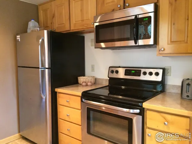 a kitchen with a sink and a window