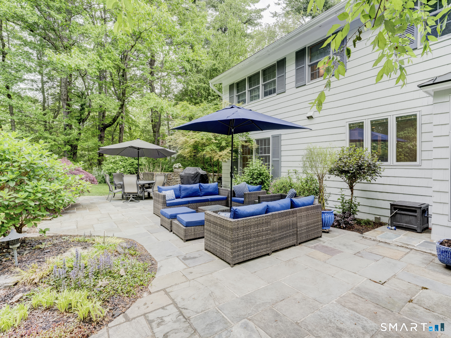 78 Windtree Street Torrington, CT 06790 - Photo 11 of 40 a view of a house with backyard and sitting area