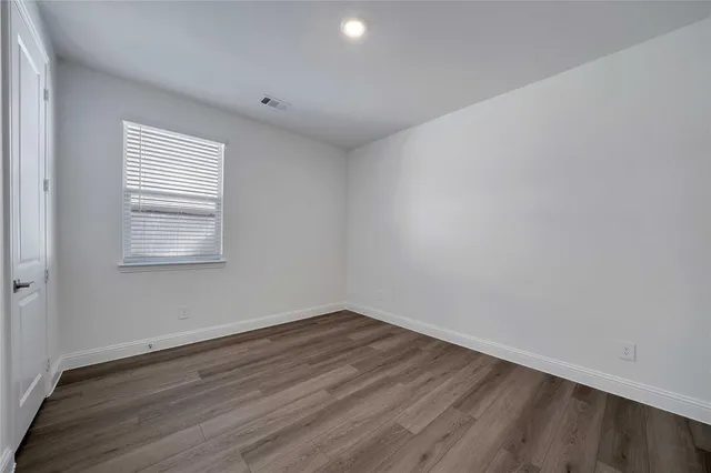 a room and a hard wood floor