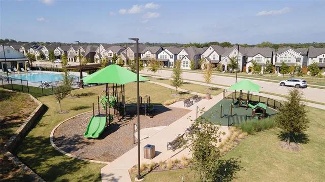 swimming pool view with a outdoor seating space