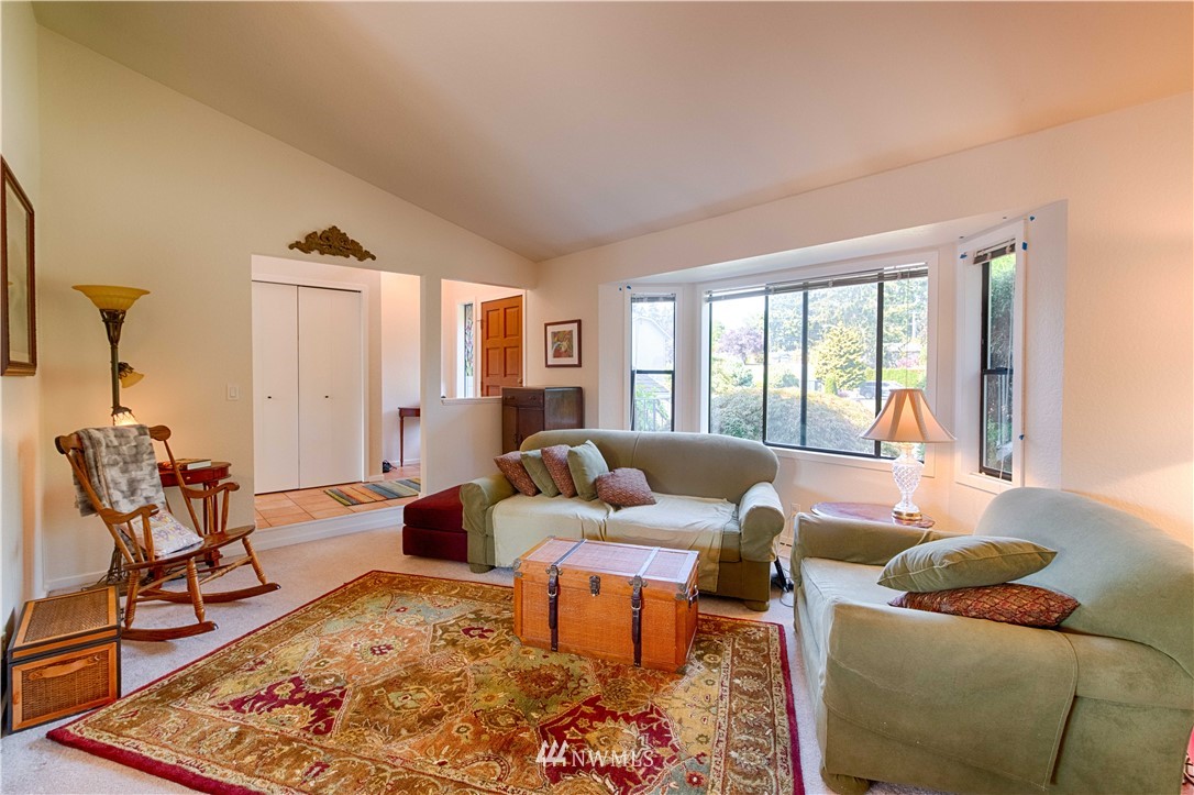 7902 211th Place Southwest Edmonds, WA 98026 - Photo 15 of 33 a living room with furniture and a rug