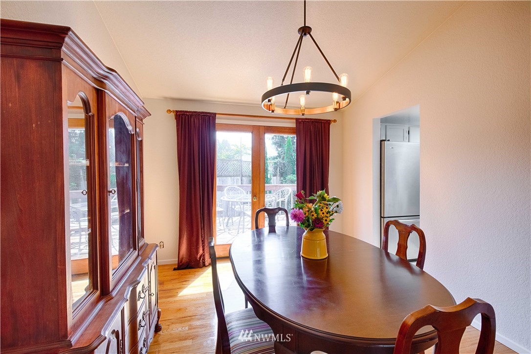 7902 211th Place Southwest Edmonds, WA 98026 - Photo 16 of 33 a dining room with furniture and window