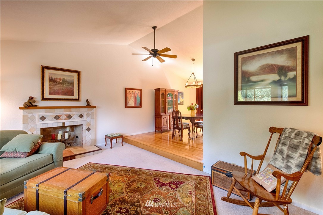 7902 211th Place Southwest Edmonds, WA 98026 - Photo 25 of 33 a living room with furniture a couch and wooden floor