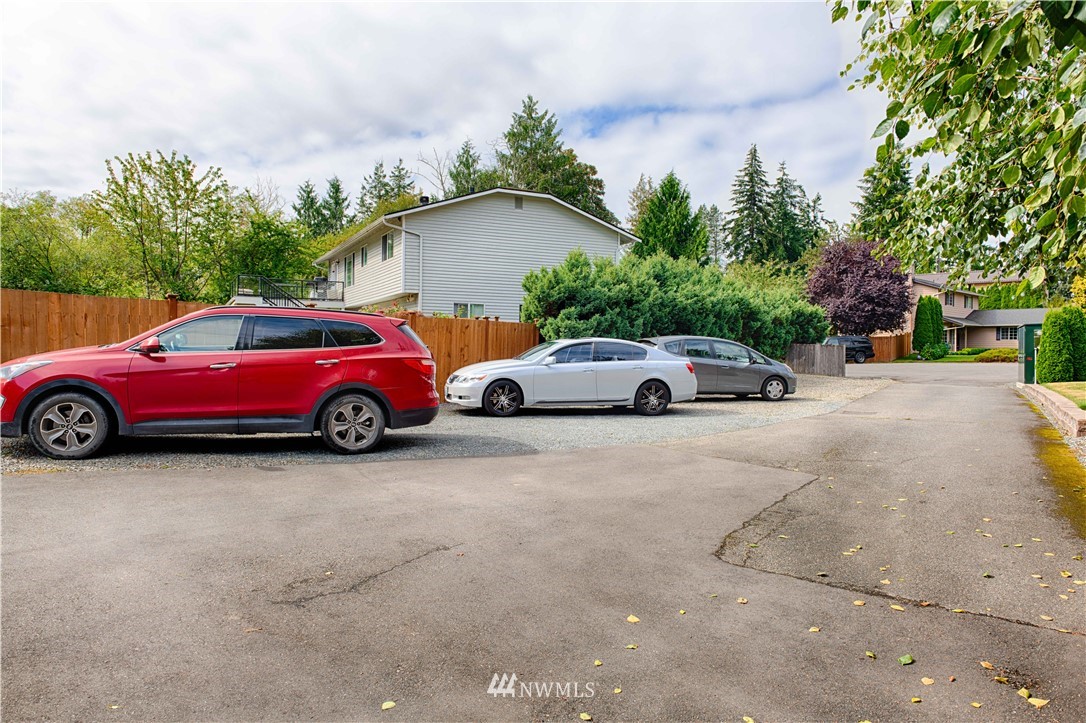 7902 211th Place Southwest Edmonds, WA 98026 - Photo 31 of 33 a view of a car parked in front of a house