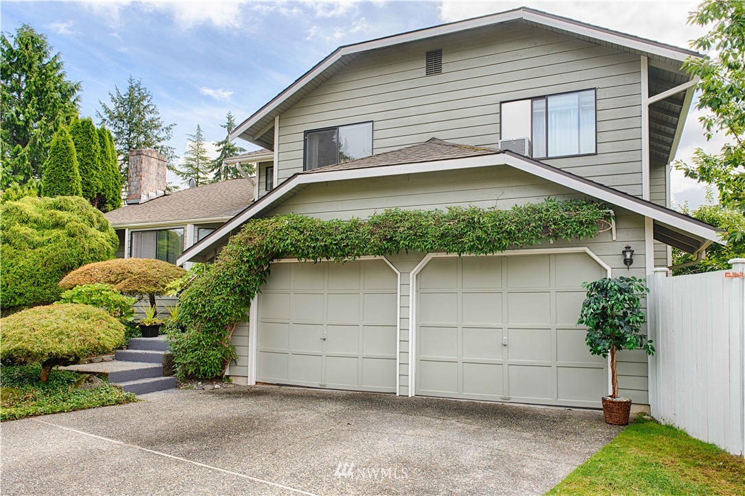 7902 211th Place Southwest Edmonds, WA 98026 - Photo 33 of 33 a front view of a house with a garage