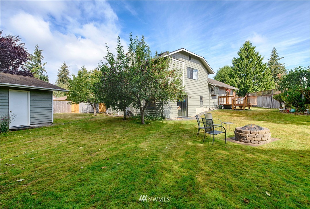 7902 211th Place Southwest Edmonds, WA 98026 - Photo 6 of 33 a view of a house with a yard