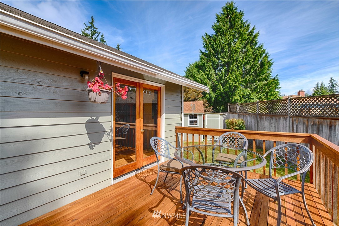 7902 211th Place Southwest Edmonds, WA 98026 - Photo 7 of 33 a view of a chairs and table in the balcony