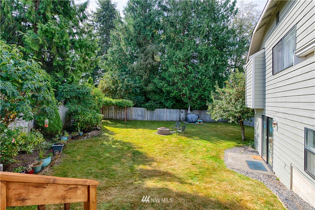 7902 211th Place Southwest Edmonds, WA 98026 - Photo 9 of 33 a view of a backyard with swimming pool