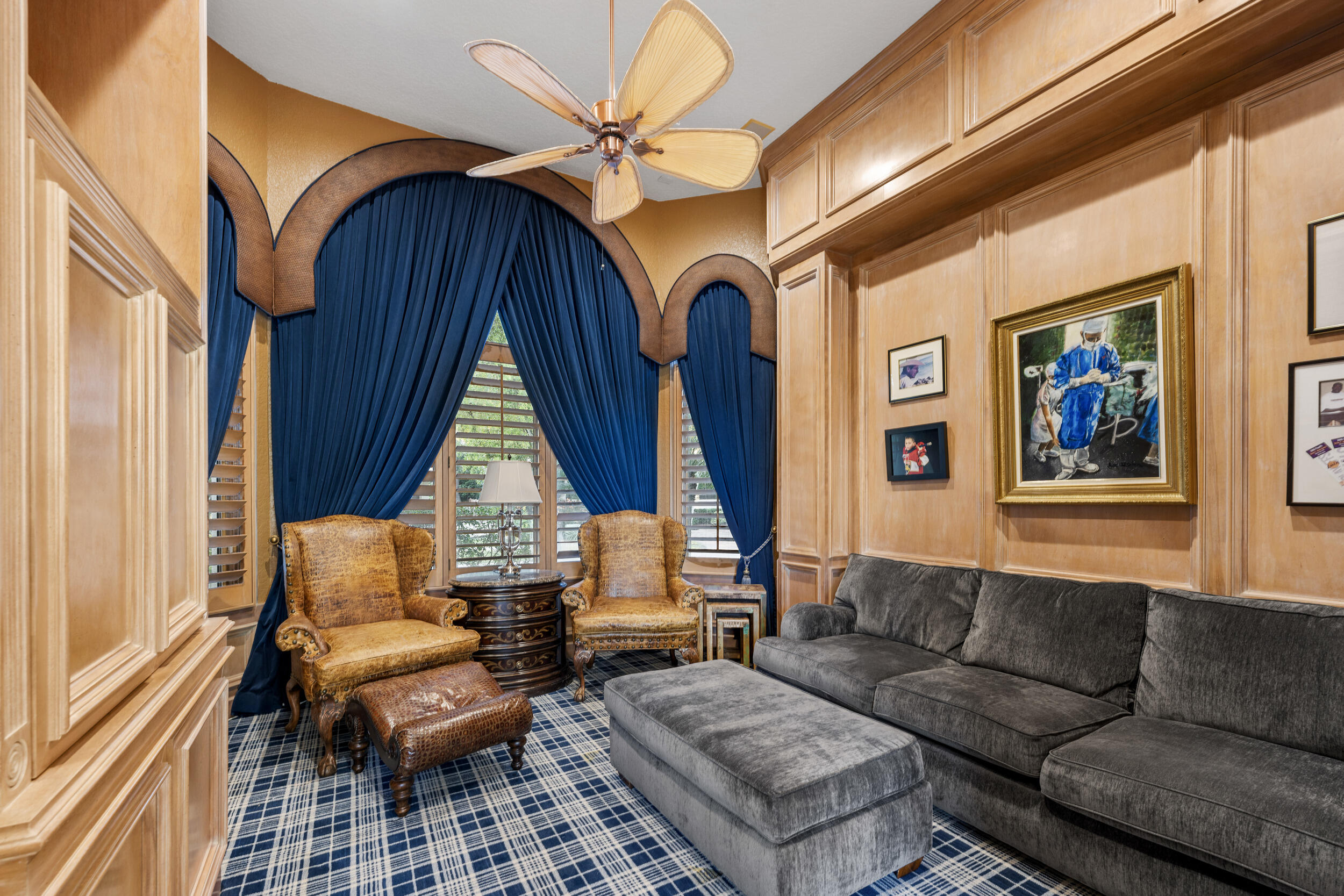 21169 Oakley Court Boca Raton, FL 33433 - Photo 13 of 60 a living room with furniture a fireplace and a large window