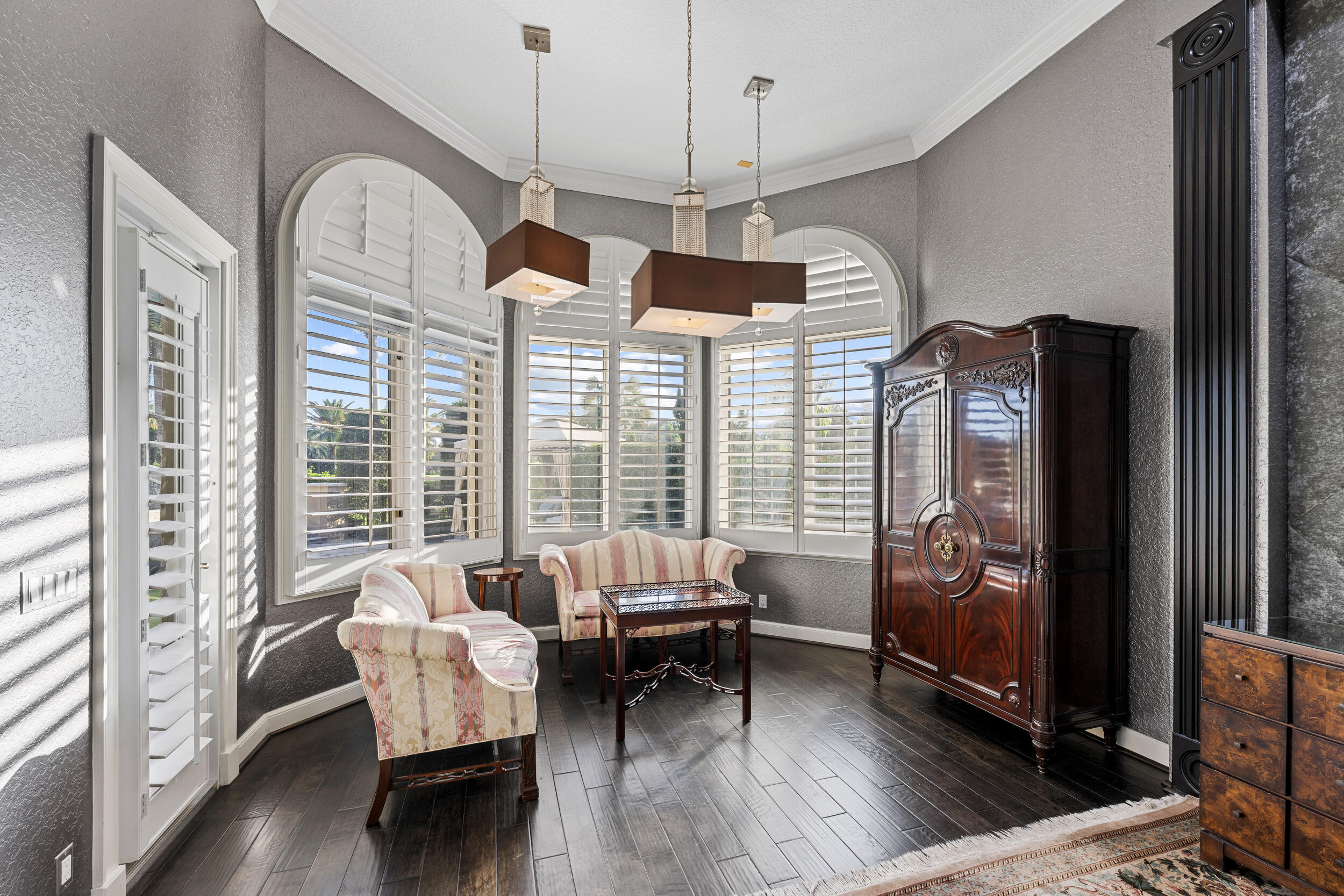 21169 Oakley Court Boca Raton, FL 33433 - Photo 18 of 60 a living room with furniture fireplace and wooden floor