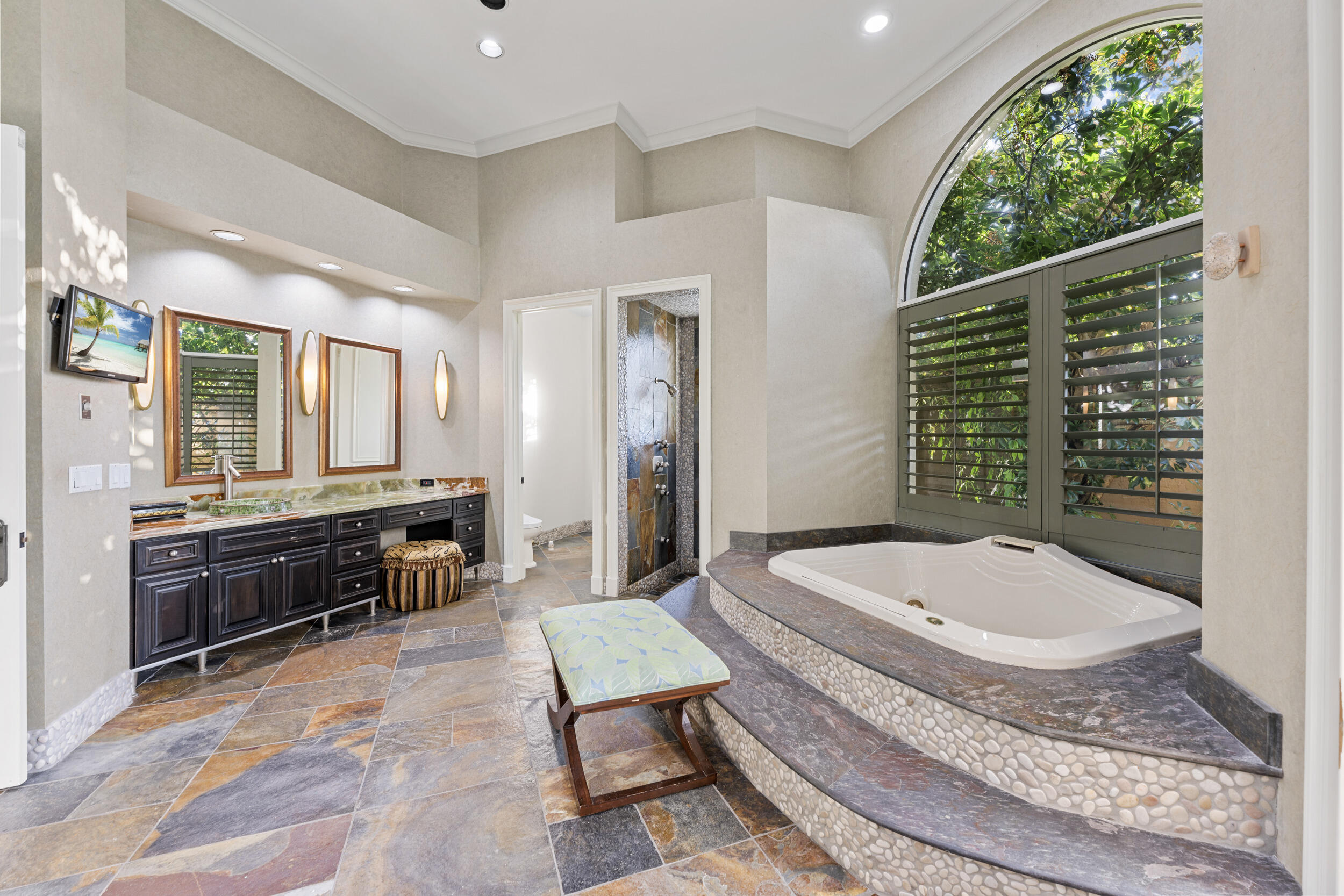 21169 Oakley Court Boca Raton, FL 33433 - Photo 21 of 60 a spacious bathroom with a tub double sink and mirror