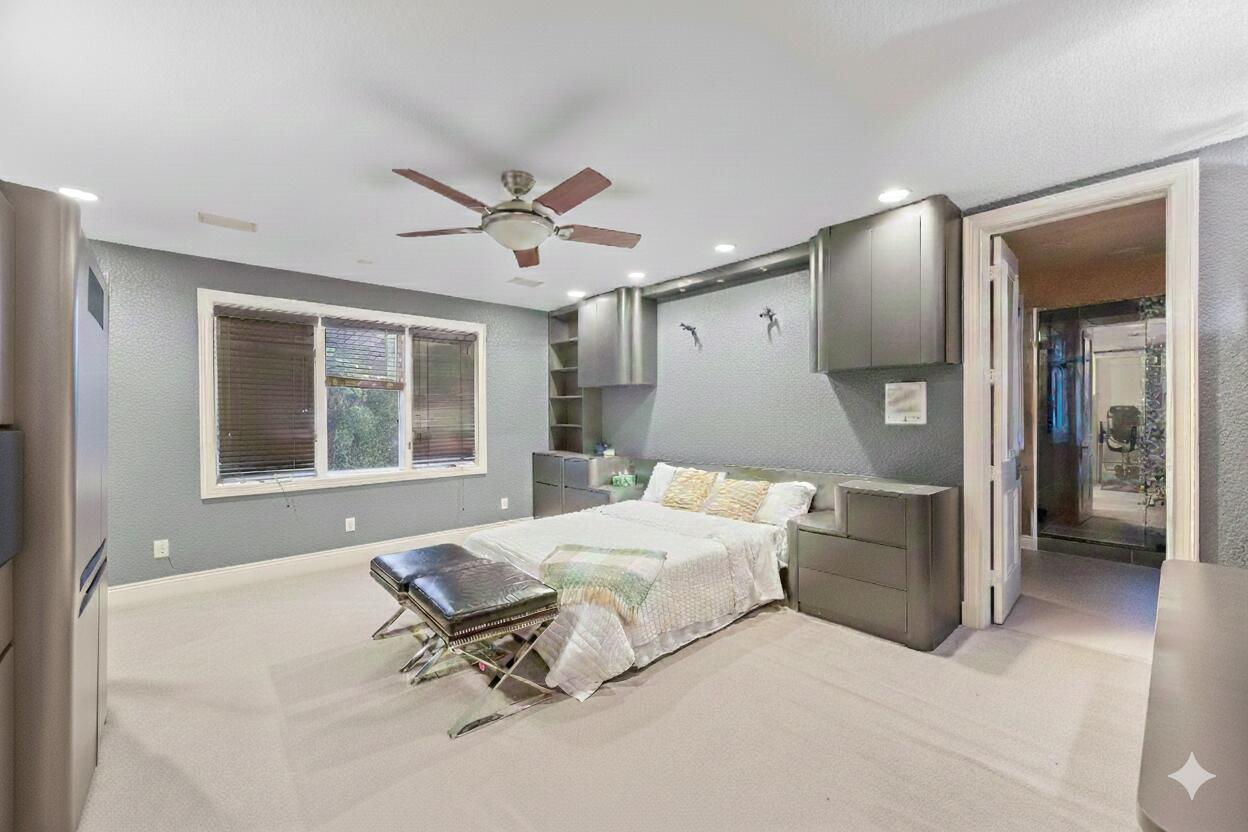 21169 Oakley Court Boca Raton, FL 33433 - Photo 29 of 60 a bed room with a bed and a chair