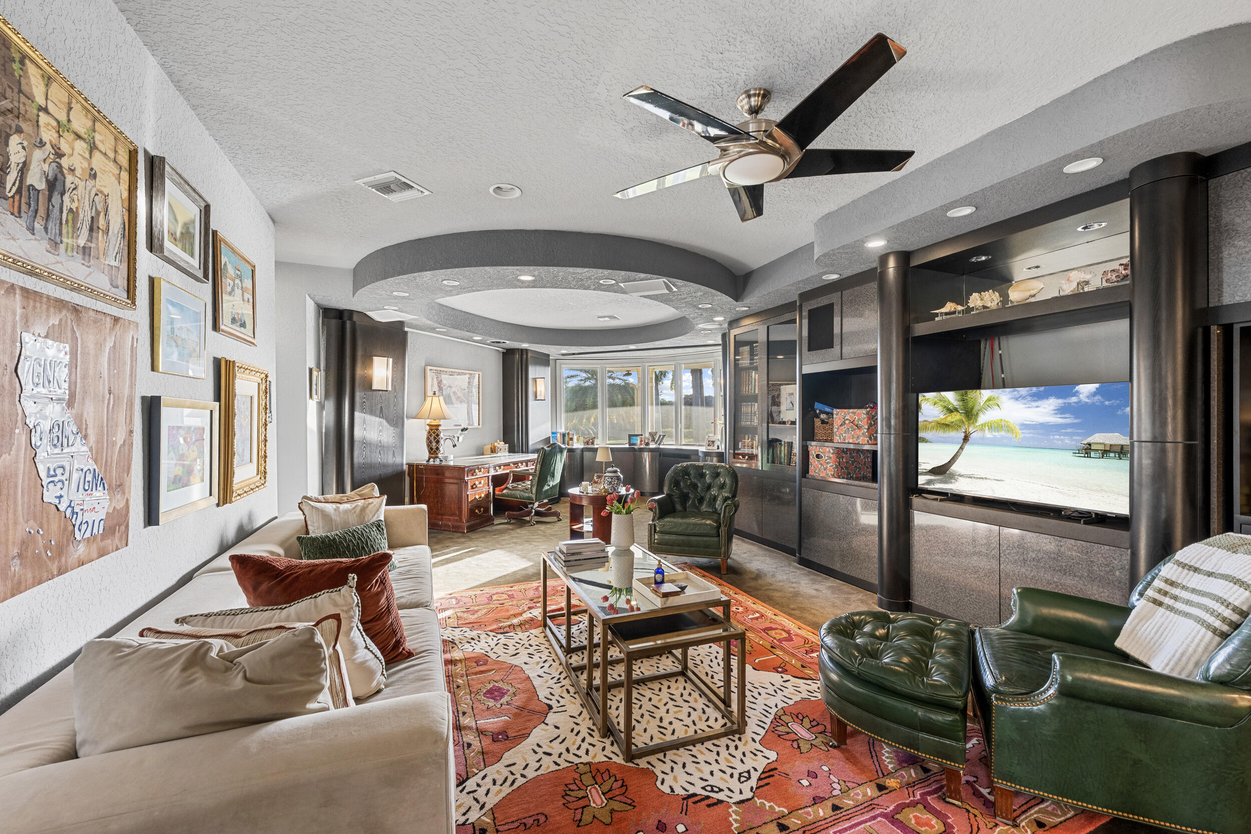 21169 Oakley Court Boca Raton, FL 33433 - Photo 31 of 60 a living room with furniture ceiling fan and a large window