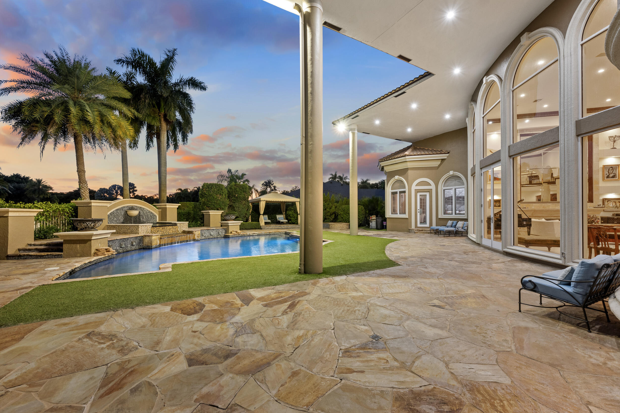21169 Oakley Court Boca Raton, FL 33433 - Photo 43 of 60 a view of swimming pool with outdoor seating and a patio
