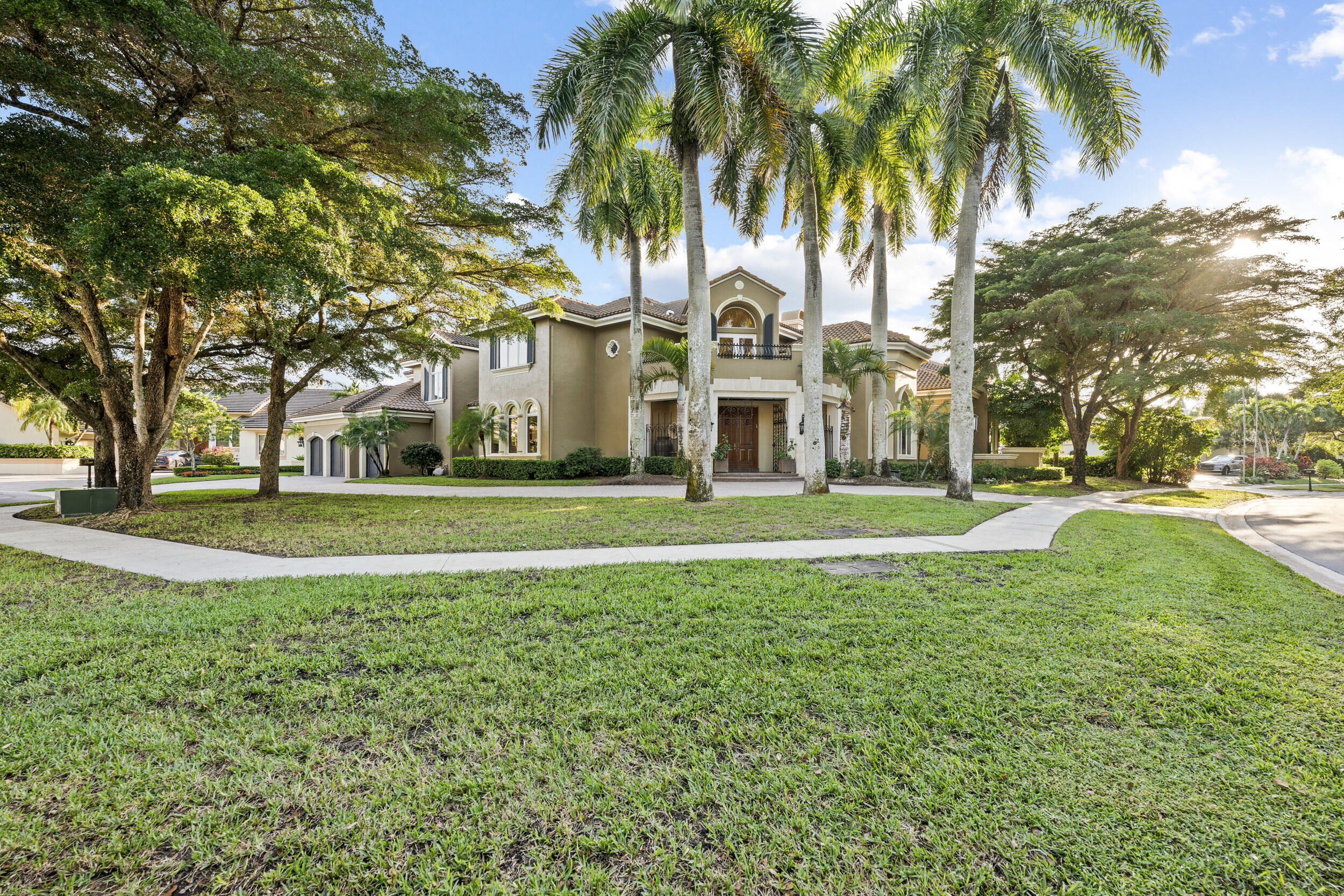 21169 Oakley Court Boca Raton, FL 33433 - Photo 48 of 60 a view of road with palm trees