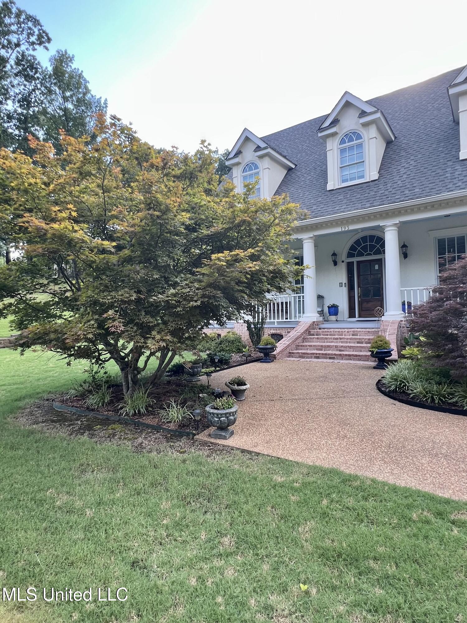 193 Crockett Loop Hernando, MS 38632 - Photo 60 of 64 Sidewalk to front porch