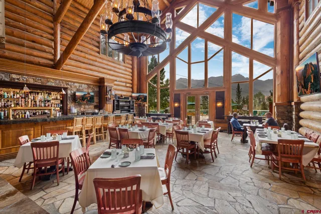 a view of a tables and chairs in patio