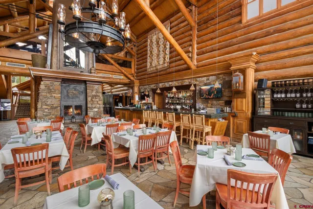 a view of a tables and chairs in patio