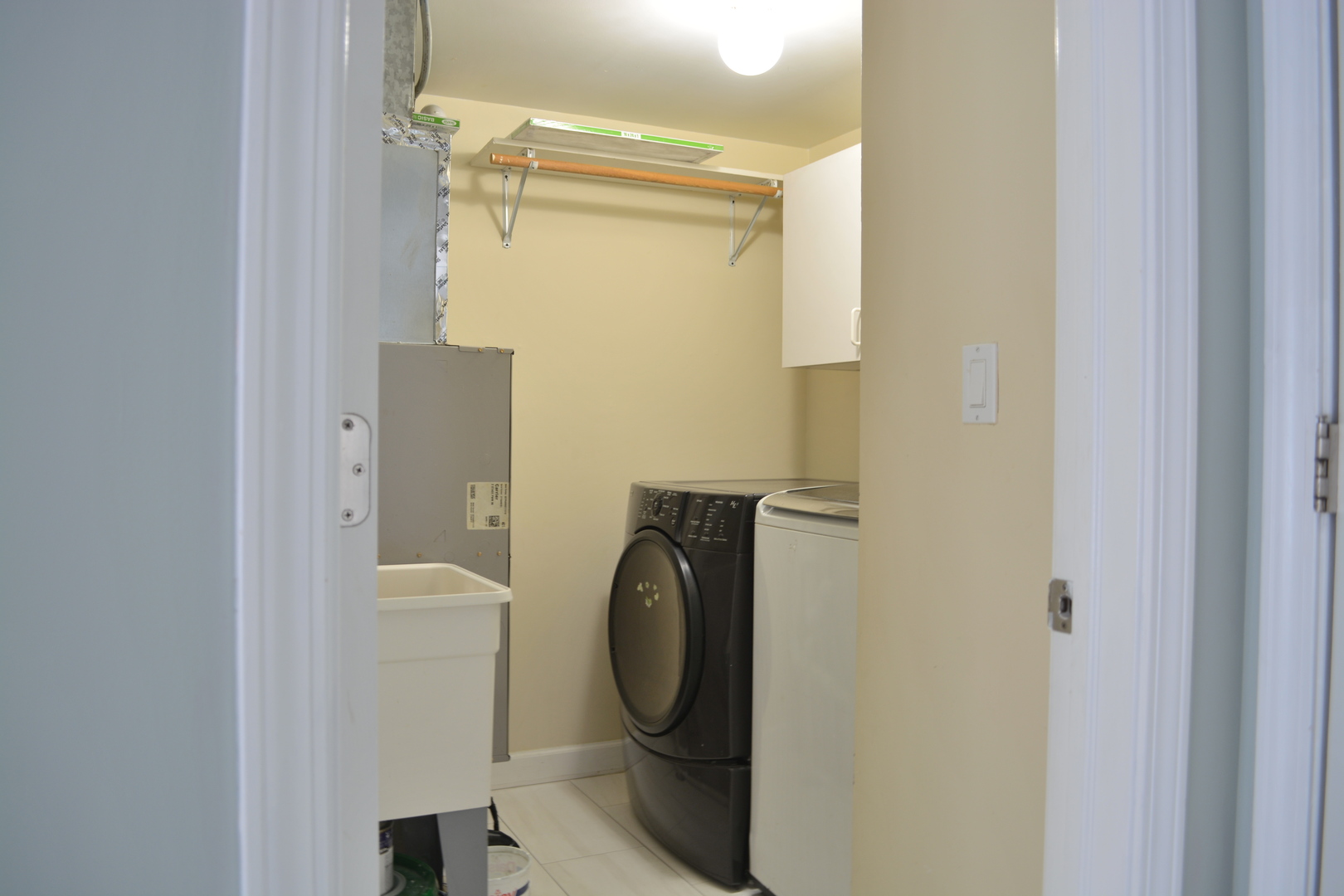 1203 Timber Drive Elk Grove Village, IL 60007 - Photo 11 of 32 a bathroom with a toilet and a sink