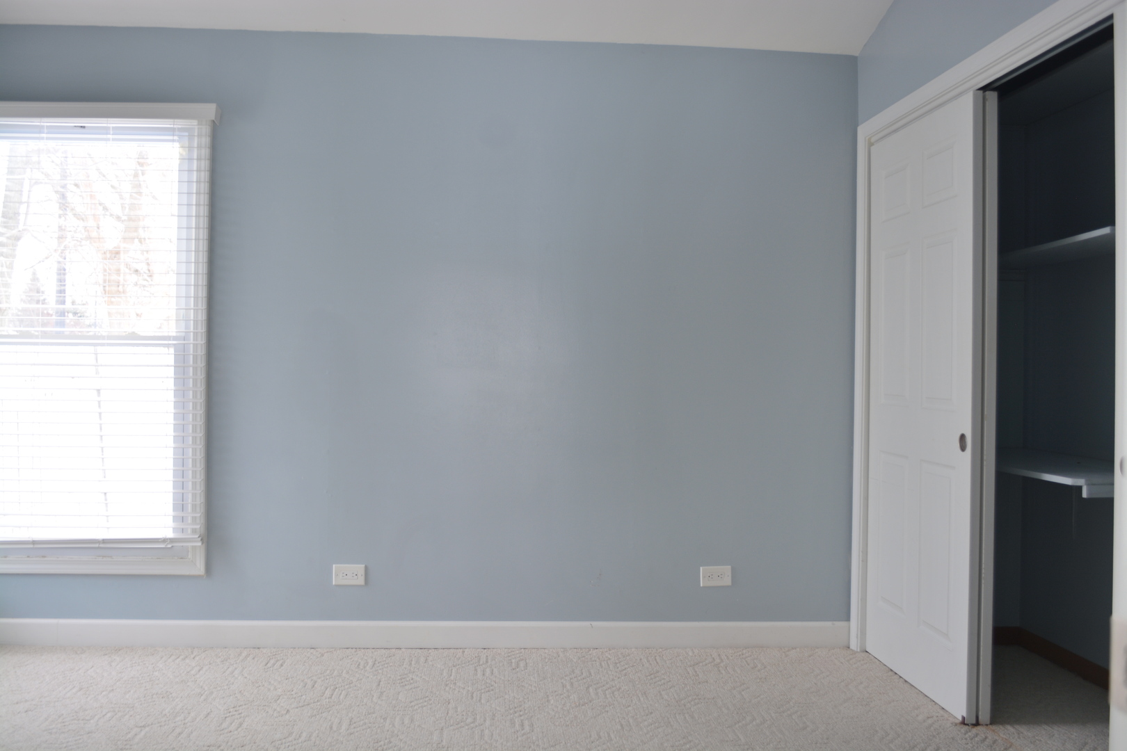 1203 Timber Drive Elk Grove Village, IL 60007 - Photo 5 of 32 a view of an empty room with a window