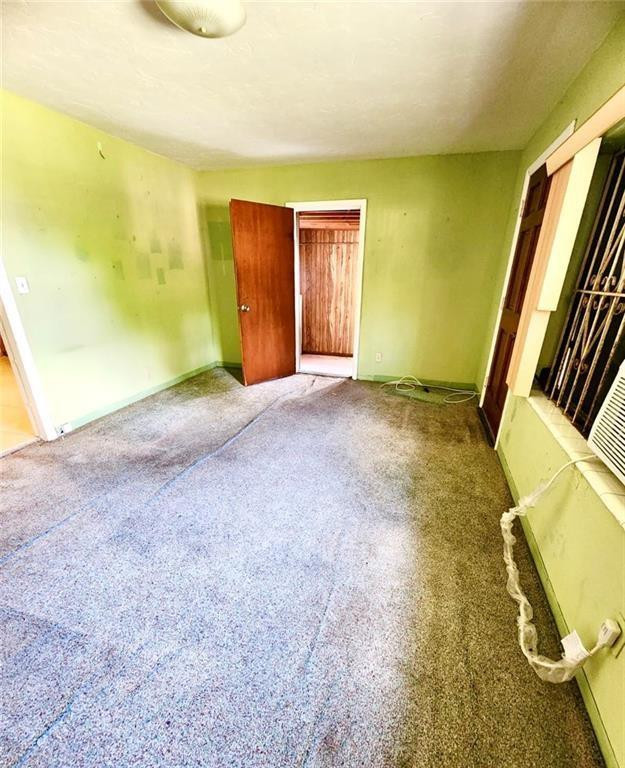 75 Northwest 52nd Street Miami, FL 33127 - Photo 7 of 12 a view of an empty room with a window