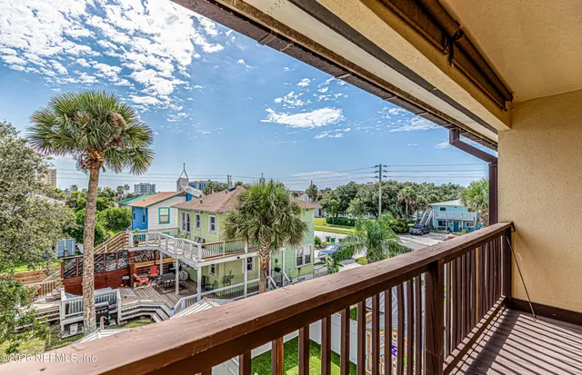 a view of a balcony with an outdoor space