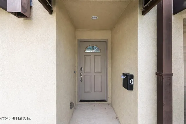 a view of a hallway with closet