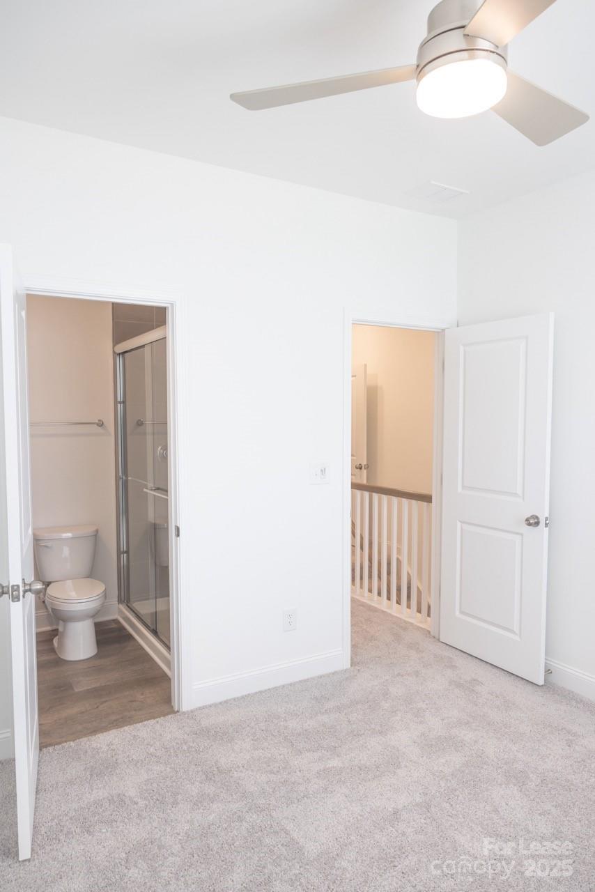 3018 Butler Hl Drive Matthews, NC 28105 - Photo 3 of 14 a view of a bathroom with a toilet