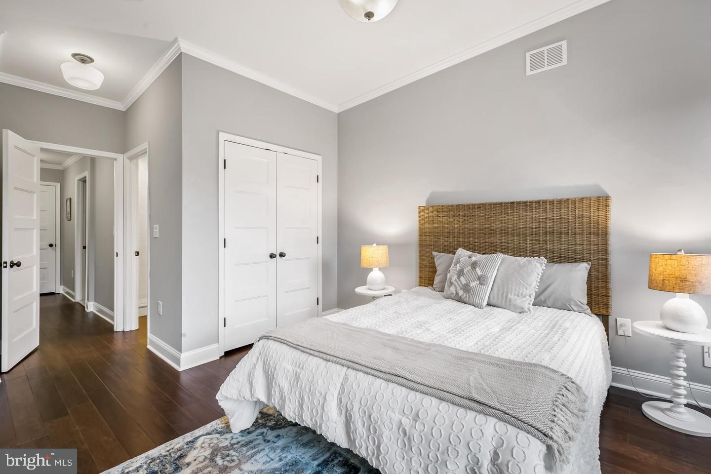 3019 Keswick Road Baltimore, MD 21211 - Photo 15 of 29 a bedroom with a bed and wooden floor