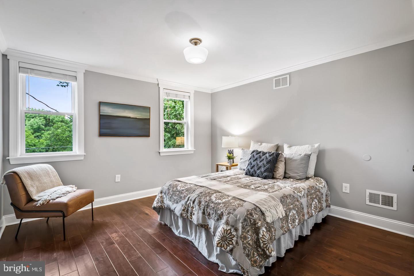 3019 Keswick Road Baltimore, MD 21211 - Photo 20 of 29 a bedroom with a bed and window