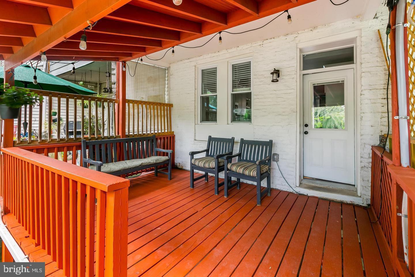 3019 Keswick Road Baltimore, MD 21211 - Photo 24 of 29 a view of a patio with a table and chairs