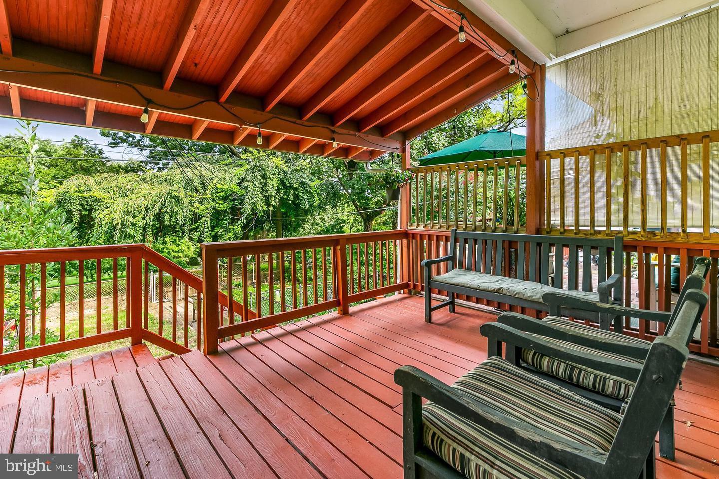 3019 Keswick Road Baltimore, MD 21211 - Photo 25 of 29 a balcony with wooden floor in outdoor space