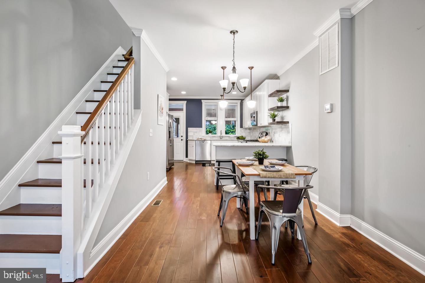 3019 Keswick Road Baltimore, MD 21211 - Photo 8 of 29 a view of a dining room with furniture and wooden floor