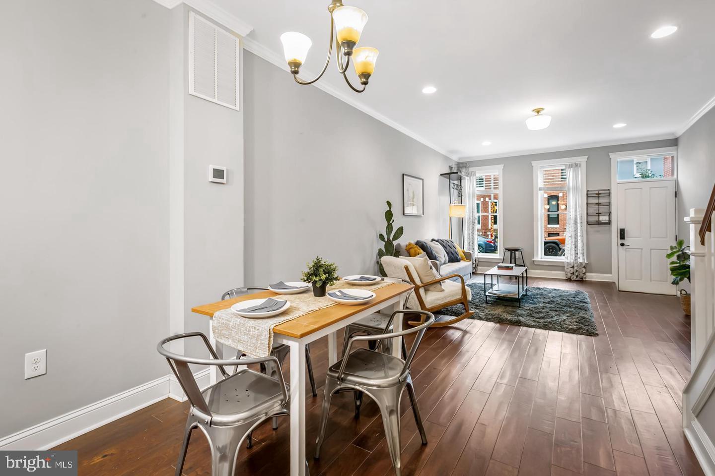 3019 Keswick Road Baltimore, MD 21211 - Photo 9 of 29 a view of a dining room with furniture window and wooden floor